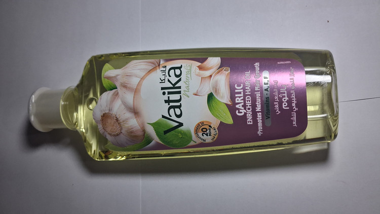 روغن موی تقویتکننده و مغذی واتیکا Vatika حجم ۲۰۰ میلیلیتر (مدل سیر و زیتون)